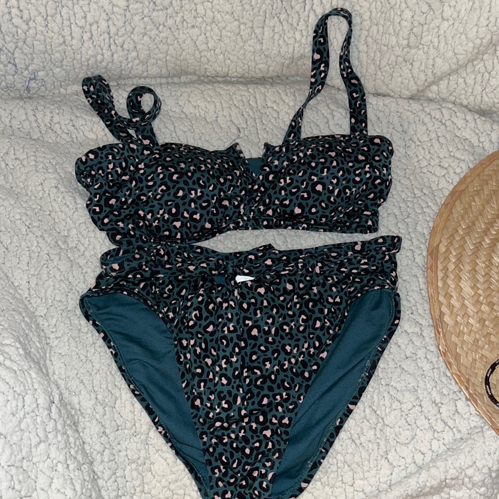 This a cute cheetah looking bikini set worn this a couple times.